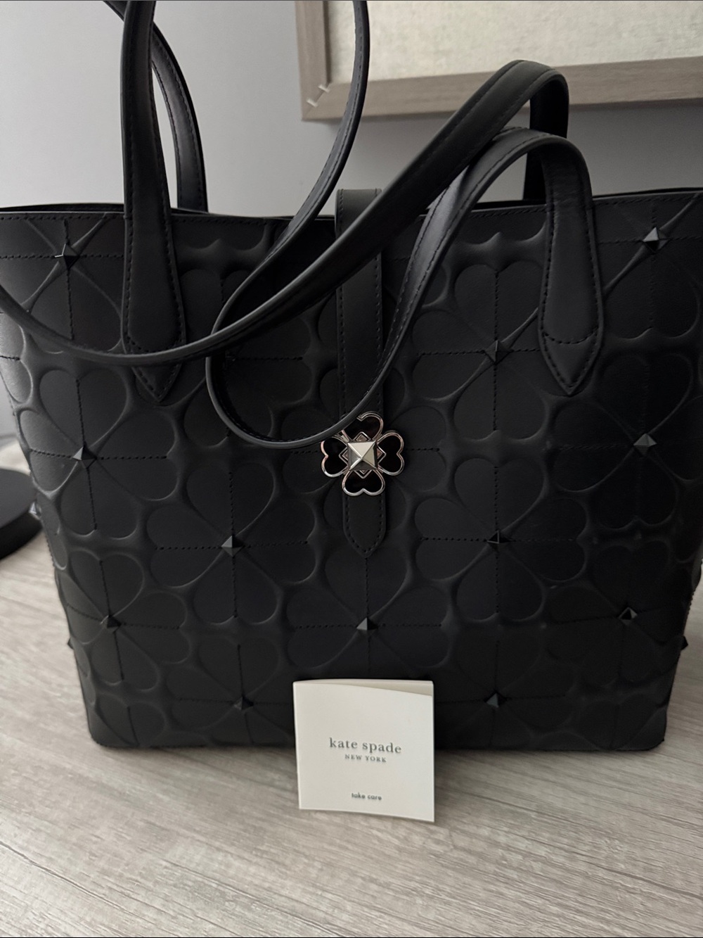 kate spade Black Quilted Clover-Embossed Tote with Clover Charm